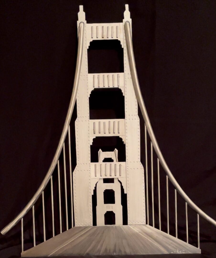 A model of the golden gate bridge in white.